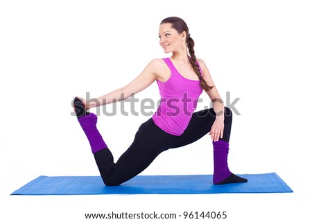 A healthy young woman exercising in gym, over white background. A series of photos in various poses in my image gallery.