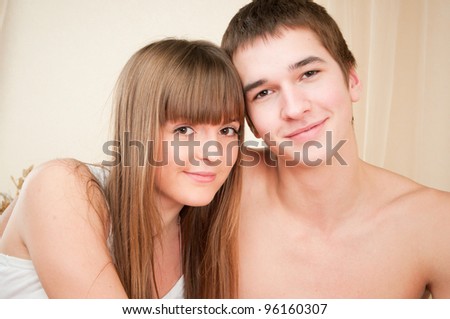 Portrait of cosy  couple relaxing in bedroom - Indoor