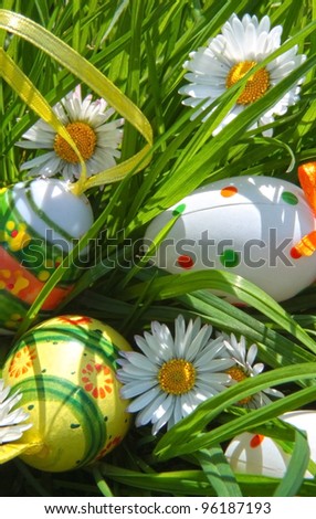 painted easter eggs in grass