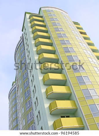 Modern building on a background sky Royalty-Free Stock Photo #96194585