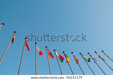 International Flags against blue sky