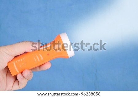 Flashlight in hand