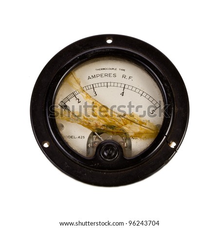 Vintage  old broken ampere meter measuring direct and indirect current isolated on white background.