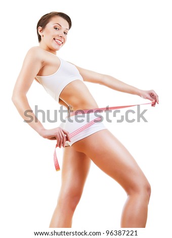 friendly cute girl in white with measure on white background