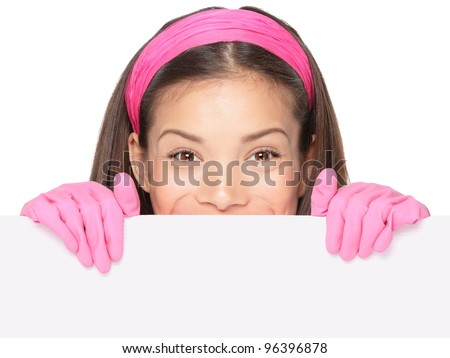 Cleaning woman showing sign. Cleaning lady holding blank paper sign. Cleaning woman in pink rubber gloves smiling happy. Mixed ethnicity Caucasian / Chinese Asian girl isolated on white background.
