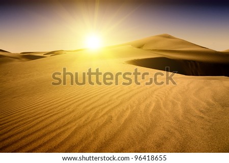 Gold desert into the sunset. Canary Islands, Canaries. Grand Canary. Maspalomas, Resort Town. Royalty-Free Stock Photo #96418655