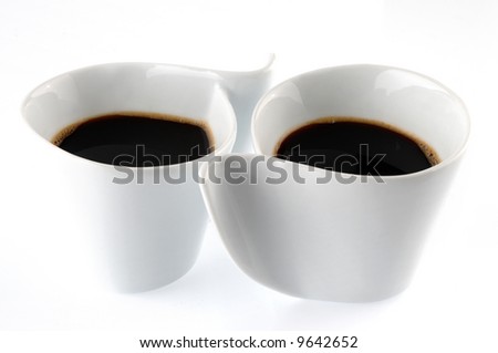 Picture of two cups of coffee on a white background