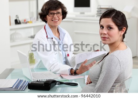 A pregnant woman at her gynecologist.