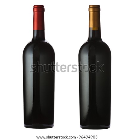 Two different red wine bottles isolated on white with clipping path. Royalty-Free Stock Photo #96494903