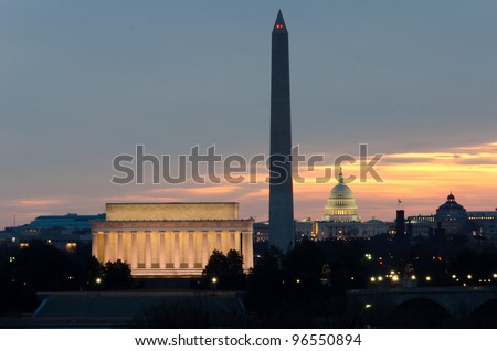 Washington DC city view at sunrise, including Lincoln Memorial, Monument and Capitol building