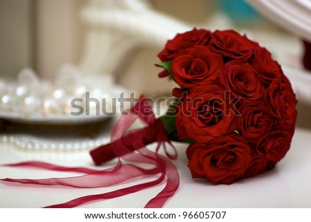 Wedding bouquet with pearls and red tapes Royalty-Free Stock Photo #96605707