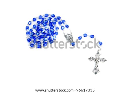 A blue and silver beaded rosary on a white background