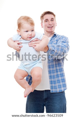 studio picture of father holding his son