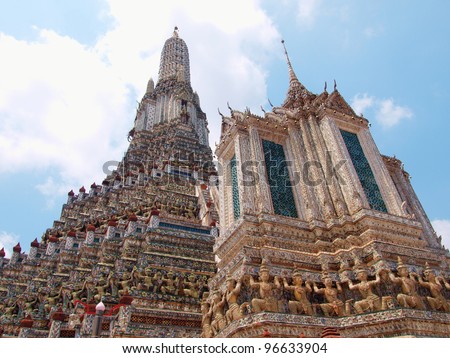 The Temple of Dawn Wat Arun and a beautiful blue sky in Bangkok, Thailand