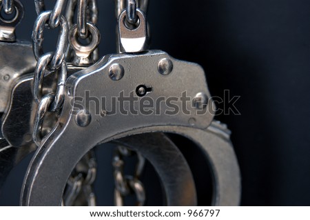 Handcuffs close-up Royalty-Free Stock Photo #966797
