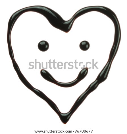 The heart with smiley face made of chocolate syrup is isolated on a white background
