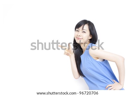 Cute woman pointing copy space, isolated on white background.