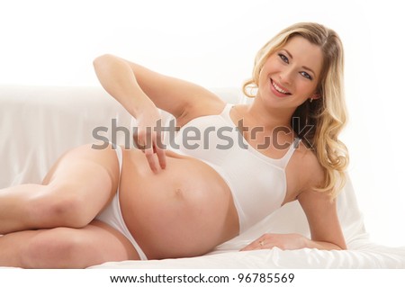 Happy pregnant girl isolated on white