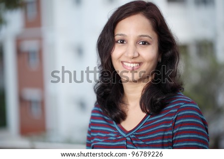 Portrait of happy young Indian woman