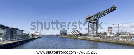 High resolution panorama of the River Clyde in Glasgow showing Finnieston Crane, Armadillo, Bell's Bridge and Science Tower.