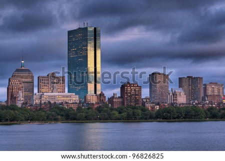Golden light illuminated the Boston Skyline viewed over the Charles River