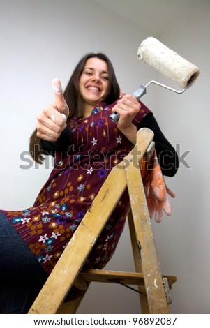 Working woman with white thumb up wide vertical