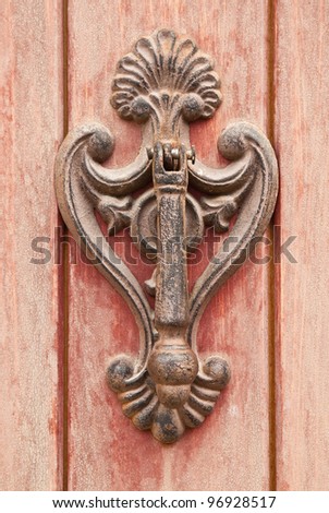  An old metal door handle knocker