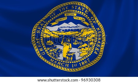 Flag of Nebraska state waving in the wind detail