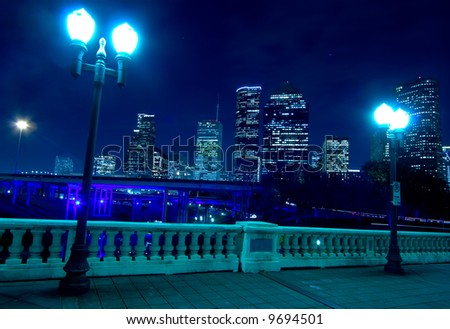 Houston skyline at night with bridge in foreground