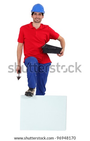 Workman with a board left blank for your message