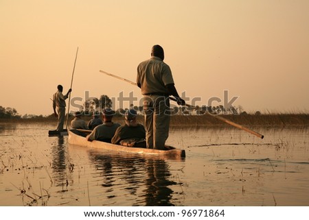Sailing in traditional mokoro in The Okavango Delta, Botswana