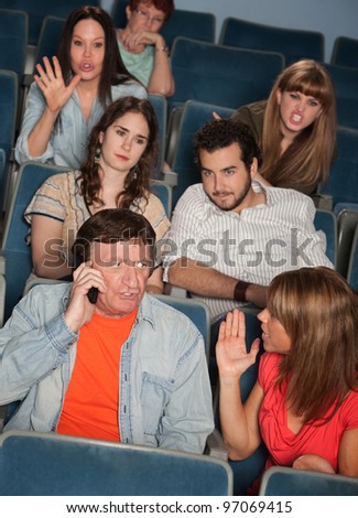 Man on phone call irks audience in theater