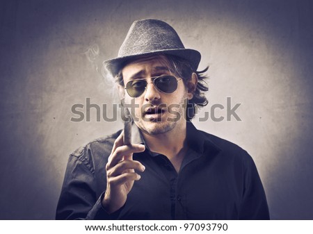 Snobbish boss smoking a cigar Royalty-Free Stock Photo #97093790