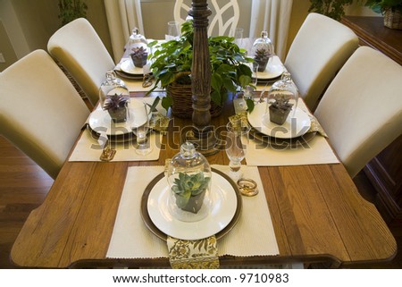 Dining table with designer decor.