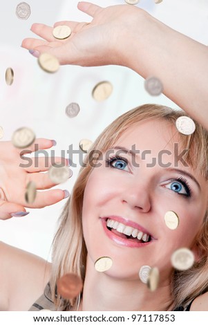 Happy woman in money rain