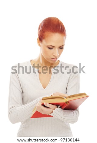 Young attractive woman with the book isolated on white
