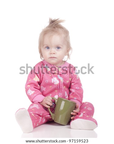 Image of a baby taking a coffee break.