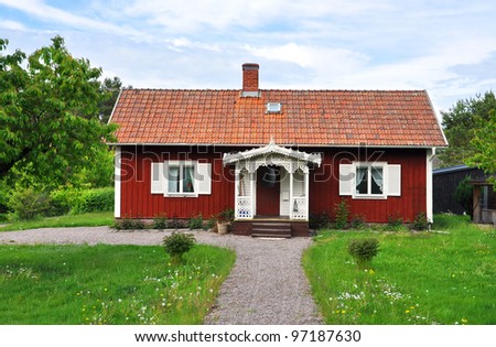 Red cottage. Typical swedish summer house. Royalty-Free Stock Photo #97187630