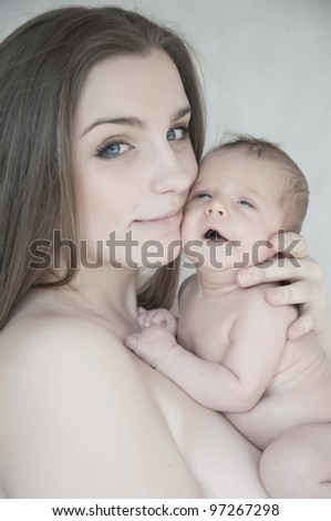 picture of happy young mother with newborn baby