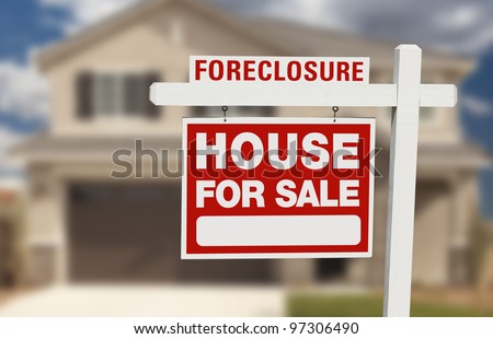 Foreclosure House For Sale Sign in Front of Beautiful Home.