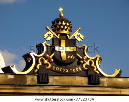 coat of arms of Pope John Paul II on the western entrance gate to the monastery of Jasna Gora in Czestochowa