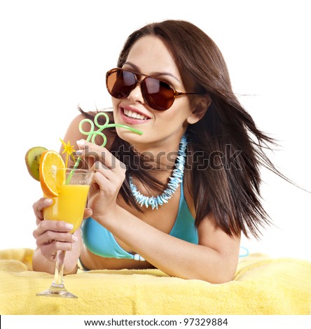 Young woman in bikini drink juice through straw. Isolated.