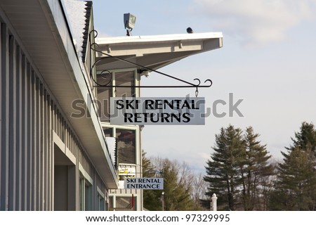 Ski Rental Returns sign at a ski resort.