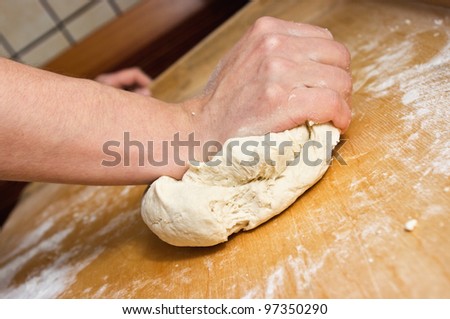 Dough making with woman hand