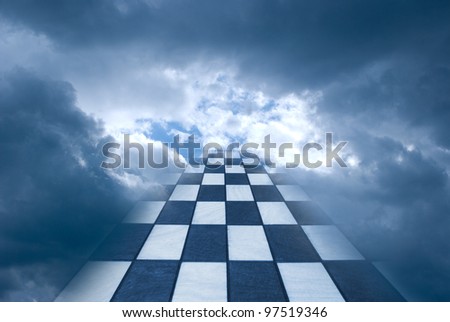 Chess board on a background of the dark blue sky. Royalty-Free Stock Photo #97519346