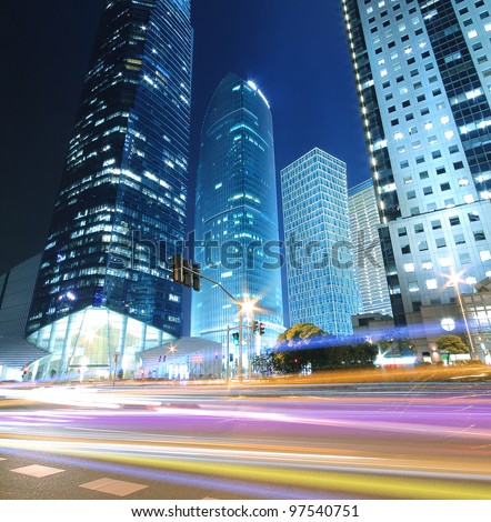 The light trails on modern office building background in shanghai China