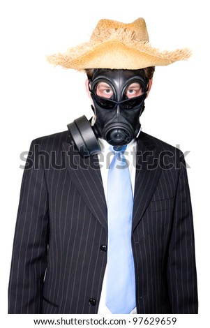 Picture of a man in a suit and gasmask and wearing sunglasses..