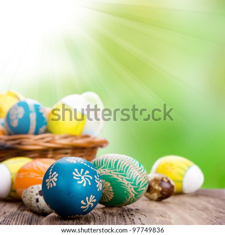 Hand painted easter eggs in basket