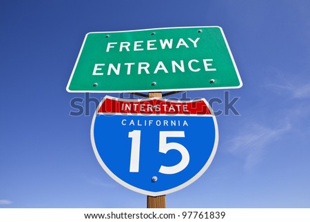 Interstate 15 freeway entrance sign in California's Mojave desert.