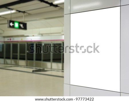 One big vertical / portrait orientation blank billboard on modern white wall with platform background